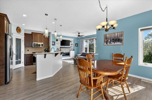 21 Mcintyre Place Nw, Langdon, AB - Indoor Photo Showing Dining Room