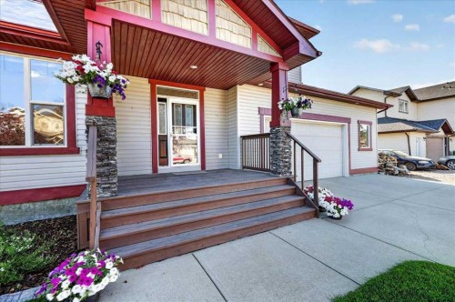 21 Mcintyre Place Nw, Langdon, AB - Outdoor With Deck Patio Veranda