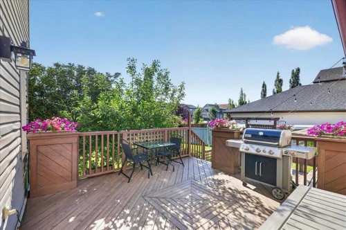 21 Mcintyre Place Nw, Langdon, AB - Outdoor With Deck Patio Veranda With Exterior
