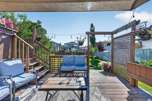 21 Mcintyre Place Nw, Langdon, AB - Outdoor With Deck Patio Veranda With Exterior