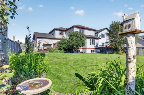 21 Mcintyre Place Nw, Langdon, AB - Outdoor With Deck Patio Veranda