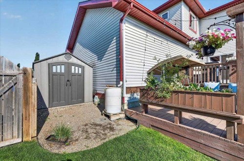 21 Mcintyre Place Nw, Langdon, AB - Outdoor With Exterior