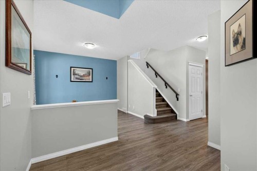 21 Mcintyre Place Nw, Langdon, AB - Indoor Photo Showing Other Room