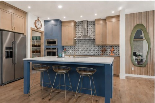 52 Cranbrook Cape Se, Calgary, AB - Indoor Photo Showing Kitchen With Upgraded Kitchen