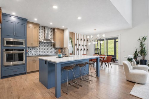 52 Cranbrook Cape Se, Calgary, AB - Indoor Photo Showing Kitchen With Upgraded Kitchen