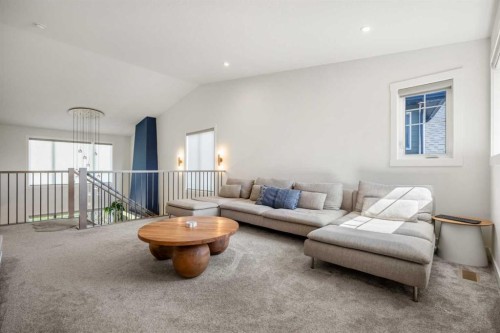 52 Cranbrook Cape Se, Calgary, AB - Indoor Photo Showing Living Room