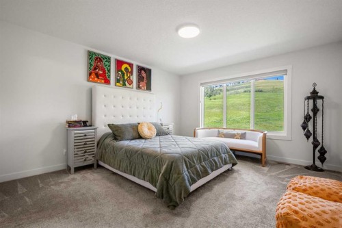 52 Cranbrook Cape Se, Calgary, AB - Indoor Photo Showing Bedroom