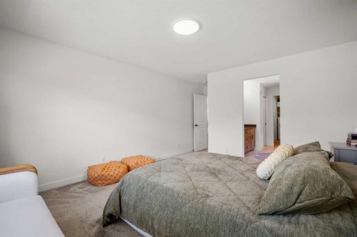 52 Cranbrook Cape Se, Calgary, AB - Indoor Photo Showing Bedroom