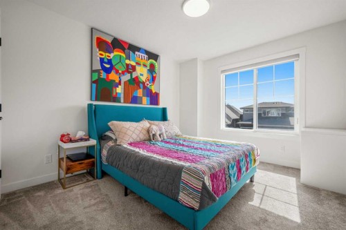 52 Cranbrook Cape Se, Calgary, AB - Indoor Photo Showing Bedroom