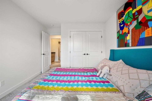 52 Cranbrook Cape Se, Calgary, AB - Indoor Photo Showing Bedroom
