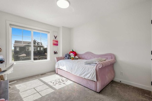 52 Cranbrook Cape Se, Calgary, AB - Indoor Photo Showing Bedroom