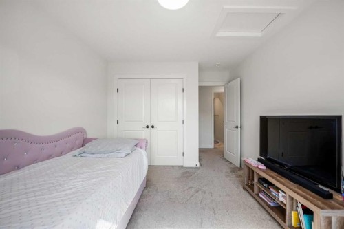 52 Cranbrook Cape Se, Calgary, AB - Indoor Photo Showing Bedroom