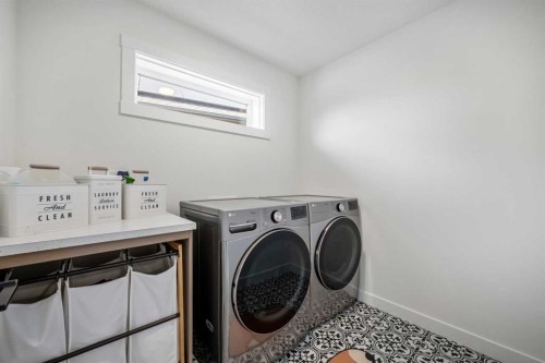 52 Cranbrook Cape Se, Calgary, AB - Indoor Photo Showing Laundry Room