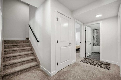 52 Cranbrook Cape Se, Calgary, AB - Indoor Photo Showing Other Room