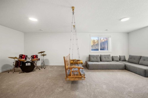 52 Cranbrook Cape Se, Calgary, AB - Indoor Photo Showing Living Room