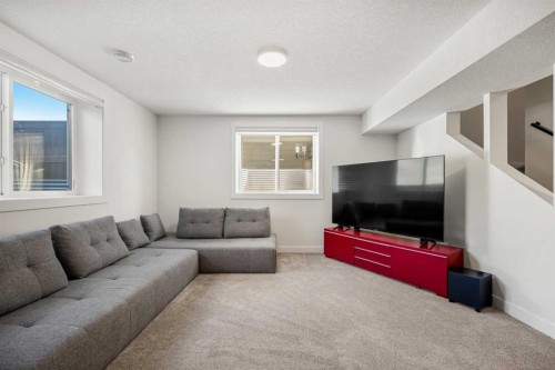 52 Cranbrook Cape Se, Calgary, AB - Indoor Photo Showing Living Room