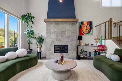 52 Cranbrook Cape Se, Calgary, AB - Indoor Photo Showing Living Room With Fireplace