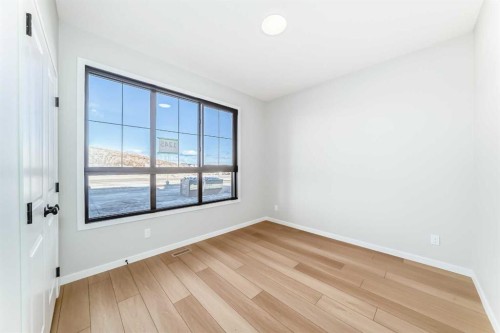 1245 Creekview Drive Sw, Calgary, AB - Indoor Photo Showing Other Room