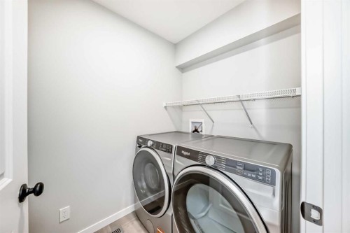 1245 Creekview Drive Sw, Calgary, AB - Indoor Photo Showing Laundry Room
