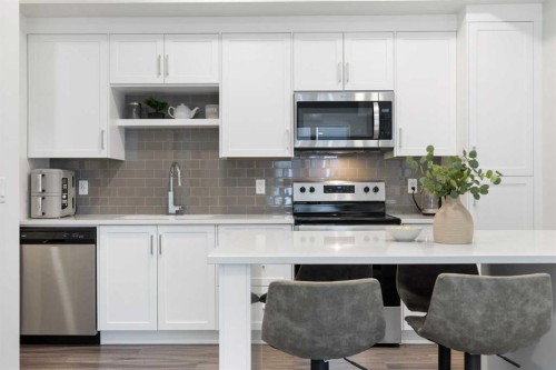 1307-100 Walgrove Court Se, Calgary, AB - Indoor Photo Showing Kitchen With Upgraded Kitchen