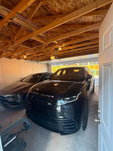41 Edith Gate Nw, Calgary, AB - Indoor Photo Showing Garage