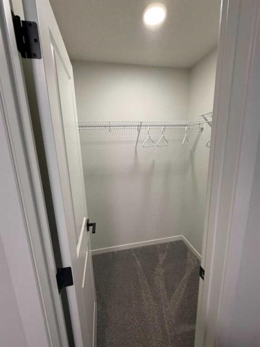 41 Edith Gate Nw, Calgary, AB - Indoor With Storage