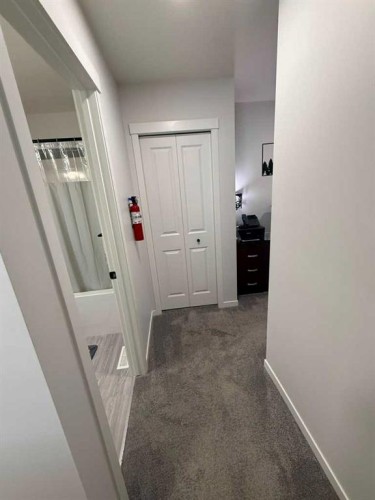 41 Edith Gate Nw, Calgary, AB - Indoor Photo Showing Other Room