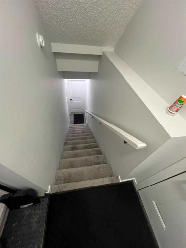 41 Edith Gate Nw, Calgary, AB - Indoor Photo Showing Other Room