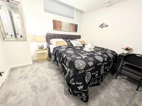 41 Edith Gate Nw, Calgary, AB - Indoor Photo Showing Bedroom