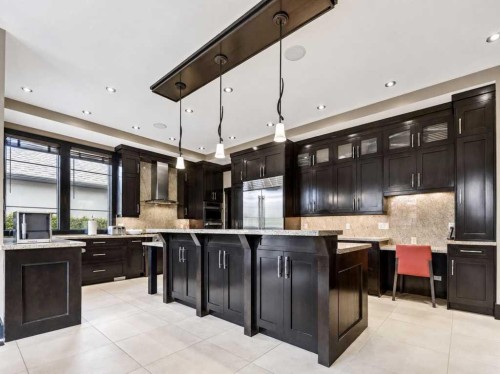 10 Aspen Ridge Way Sw, Calgary, AB - Indoor Photo Showing Kitchen With Upgraded Kitchen