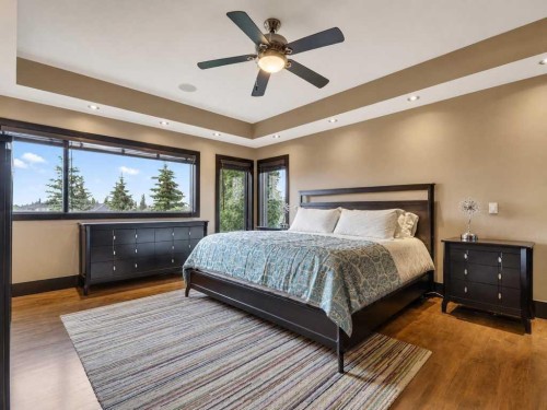 10 Aspen Ridge Way Sw, Calgary, AB - Indoor Photo Showing Bedroom