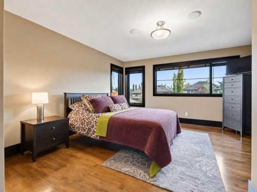 10 Aspen Ridge Way Sw, Calgary, AB - Indoor Photo Showing Bedroom