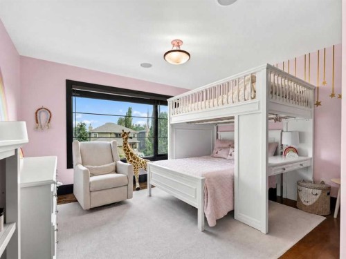 10 Aspen Ridge Way Sw, Calgary, AB - Indoor Photo Showing Bedroom