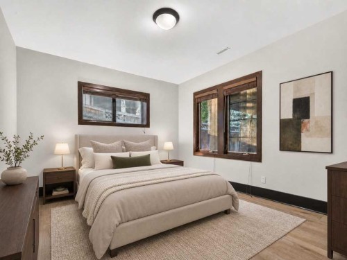 10 Aspen Ridge Way Sw, Calgary, AB - Indoor Photo Showing Bedroom