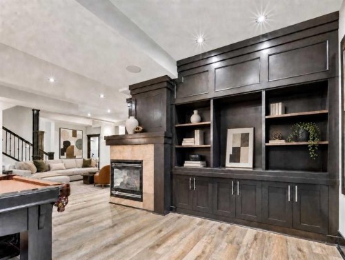 10 Aspen Ridge Way Sw, Calgary, AB - Indoor With Fireplace