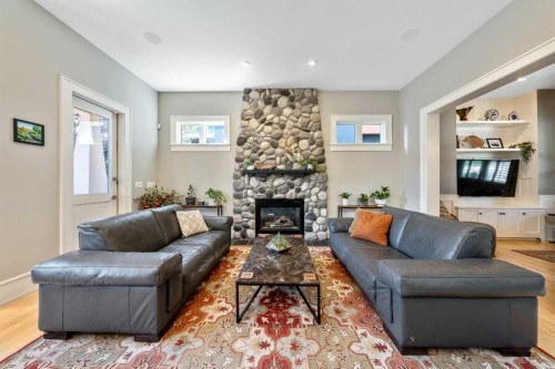 2333 Westmount Road Nw, Calgary, AB - Indoor Photo Showing Living Room With Fireplace
