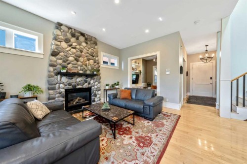 2333 Westmount Road Nw, Calgary, AB - Indoor Photo Showing Living Room With Fireplace