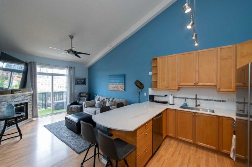 235-112 14 Avenue Se, Calgary, AB - Indoor With Fireplace