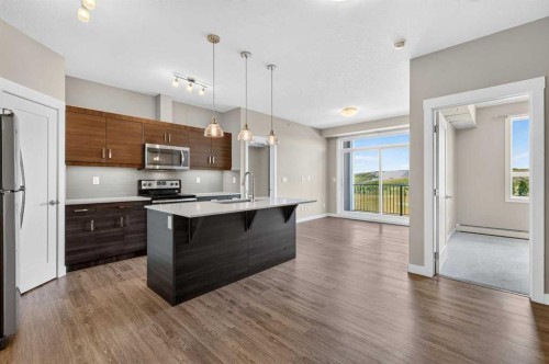 418-10 Walgrove Walk Se, Calgary, AB - Indoor Photo Showing Kitchen With Stainless Steel Kitchen With Upgraded Kitchen