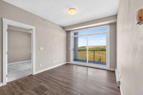418-10 Walgrove Walk Se, Calgary, AB - Indoor Photo Showing Other Room