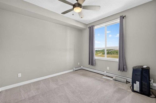 418-10 Walgrove Walk Se, Calgary, AB - Indoor Photo Showing Other Room