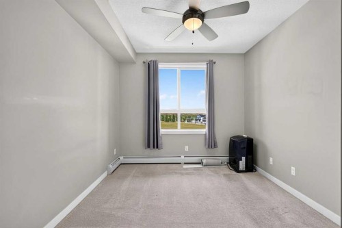 418-10 Walgrove Walk Se, Calgary, AB - Indoor Photo Showing Other Room