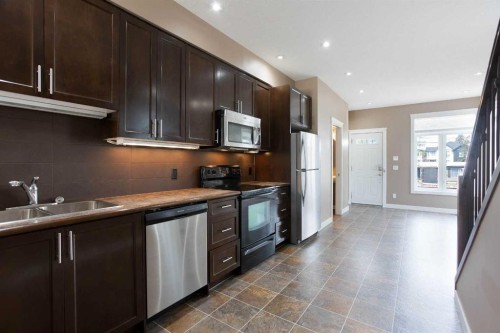 4510 73 Street Nw, Calgary, AB - Indoor Photo Showing Kitchen With Double Sink
