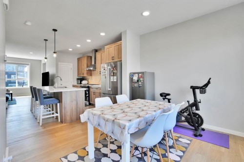 152 Belmont Way Sw, Calgary, AB - Indoor Photo Showing Dining Room