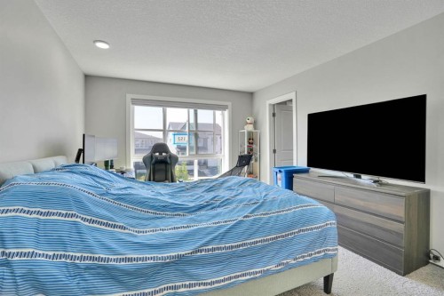 152 Belmont Way Sw, Calgary, AB - Indoor Photo Showing Bedroom
