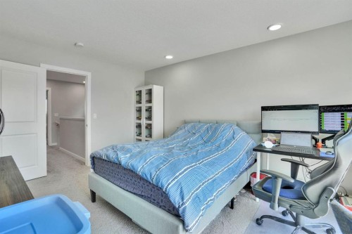152 Belmont Way Sw, Calgary, AB - Indoor Photo Showing Bedroom