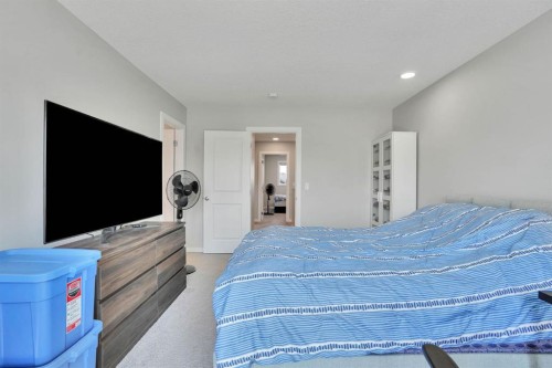 152 Belmont Way Sw, Calgary, AB - Indoor Photo Showing Bedroom