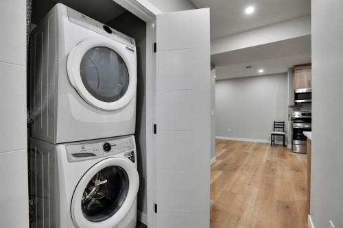 152 Belmont Way Sw, Calgary, AB - Indoor Photo Showing Laundry Room