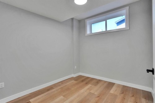 152 Belmont Way Sw, Calgary, AB - Indoor Photo Showing Other Room