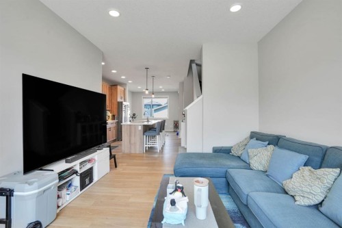 152 Belmont Way Sw, Calgary, AB - Indoor Photo Showing Living Room